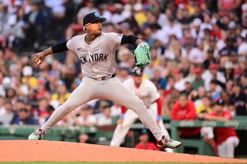 Jun 16, 2024; Boston, Massachusetts, USA; New York Yankees starting pitcher Marcus Stroman (0) pitches against the Boston Red Sox during the third inning at Fenway Park. Mandatory Credit: Eric Canha-USA TODAY Sports