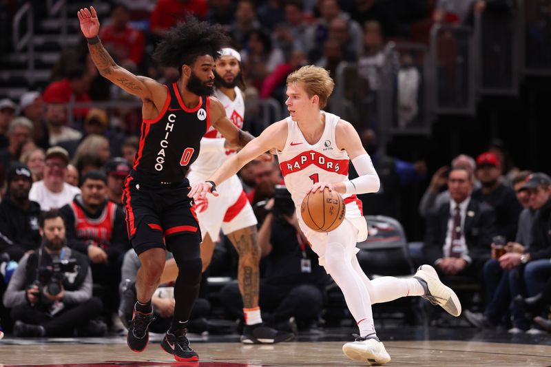 CHICAGO, ILLINOIS - JANUARY 30: Gradey Dick #1 of the Toronto Raptors drives to the basket against Coby White #0 of the Chicago Bulls during the first half at the United Center on January 30, 2024 in Chicago, Illinois. NOTE TO USER: User expressly acknowledges and agrees that, by downloading and or using this photograph, User is consenting to the terms and conditions of the Getty Images License Agreement.  (Photo by Michael Reaves/Getty Images)