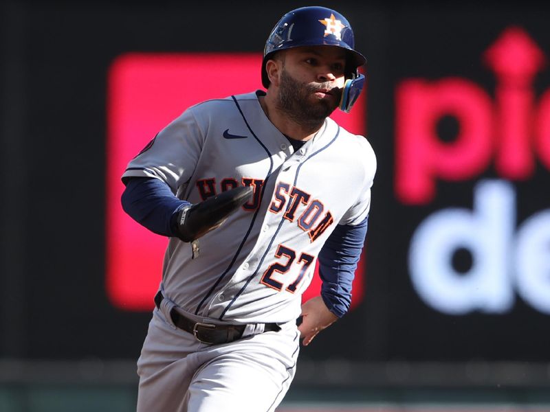Oct 10, 2023; Minneapolis, Minnesota, USA; Houston Astros second baseman Jose Altuve (27) rounds second base in the first inning against the Minnesota Twins during game three of the ALDS for the 2023 MLB playoffs at Target Field. Mandatory Credit: Jesse Johnson-USA TODAY Sports