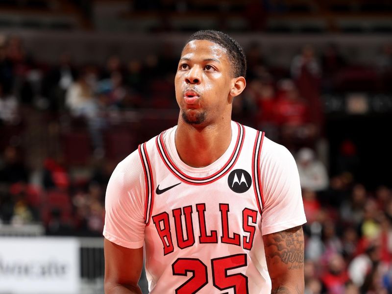 CHICAGO, IL - OCTOBER 19: Dalen Terry #25 of the Chicago Bulls prepares to shoot a free throw during the game against the Minnesota Timberwolves on October 19, 2023 at United Center in Chicago, Illinois. NOTE TO USER: User expressly acknowledges and agrees that, by downloading and or using this photograph, User is consenting to the terms and conditions of the Getty Images License Agreement. Mandatory Copyright Notice: Copyright 2023 NBAE (Photo by Jeff Haynes/NBAE via Getty Images)