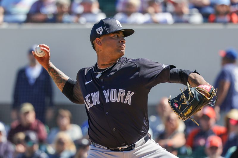 Feb 24, 2024; Lakeland, Florida, USA; New York Yankees starting pitcher Luis Gil (81) pitches during the first inning against the Detroit Tigers at Publix Field at Joker Marchant Stadium. Mandatory Credit: Mike Watters-USA TODAY Sports