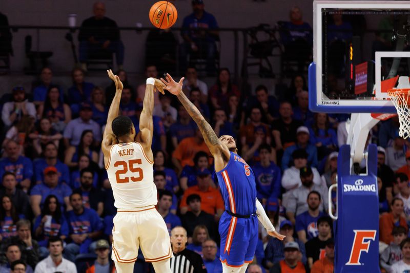 Jan 18, 2025; Gainesville, Florida, USA; Texas Longhorns forward Jayson Kent (25) shoots over Florida Gators guard Will Richard (5) during the second half at Exactech Arena at the Stephen C. O'Connell Center. Mandatory Credit: Matt Pendleton-Imagn Images