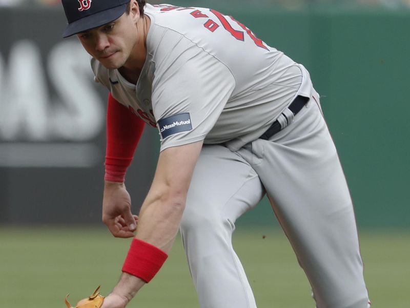 Apr 21, 2024; Pittsburgh, Pennsylvania, USA;  Boston Red Sox third baseman Bobby Dalbec (29) fields a ground ball for  an out on a ball hit by Pittsburgh Pirates designated hitter Andrew McCutchen (not pictured) during the sixth inning at PNC Park. Mandatory Credit: Charles LeClaire-USA TODAY Sports