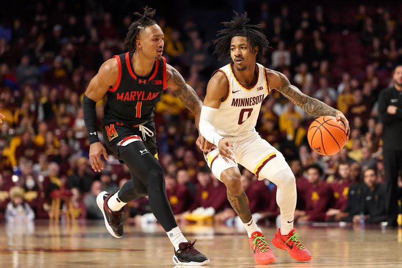 Jan 7, 2024; Minneapolis, Minnesota, USA; Minnesota Golden Gophers guard Elijah Hawkins (0) dribbles the ball past Maryland Terrapins guard Jahmir Young (1) during the first half at Williams Arena. Mandatory Credit: Matt Krohn-USA TODAY Sports