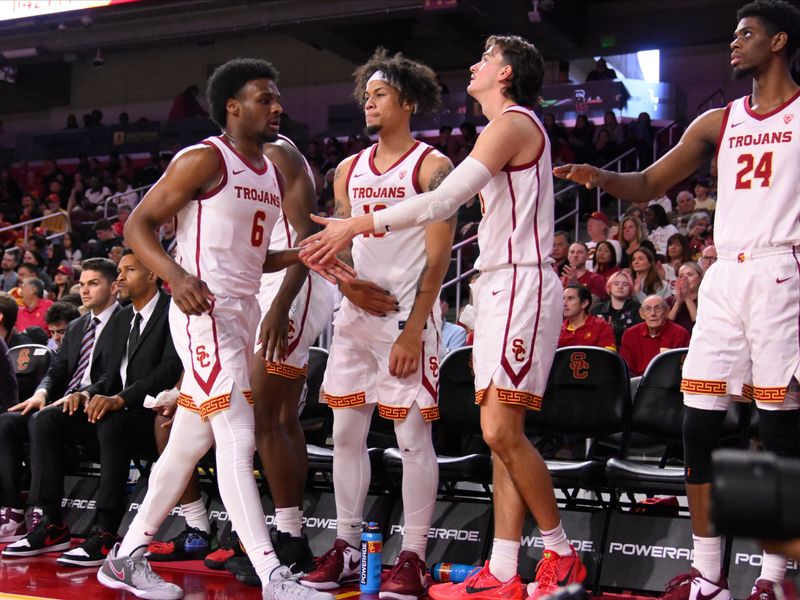 Dec 10, 2023; Los Angeles, California, USA; USC Trojans guard Bronny James (6) returns to the bench during the first half against the Long Beach State 49ers at Galen Center. Mandatory Credit: Robert Hanashiro-USA TODAY Sports