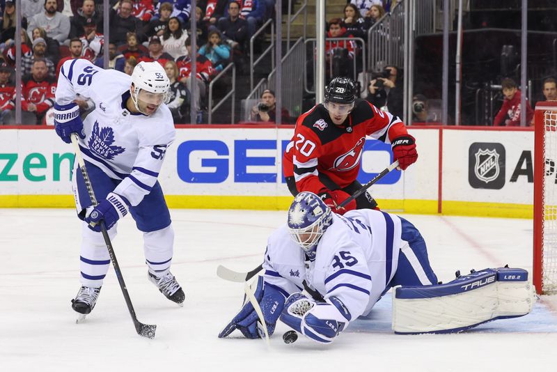 Mar 7, 2023; Newark, New Jersey, USA; Toronto Maple Leafs goaltender Ilya Samsonov (35) makes a save against the New Jersey Devils during the second period at Prudential Center. Mandatory Credit: Ed Mulholland-USA TODAY Sports