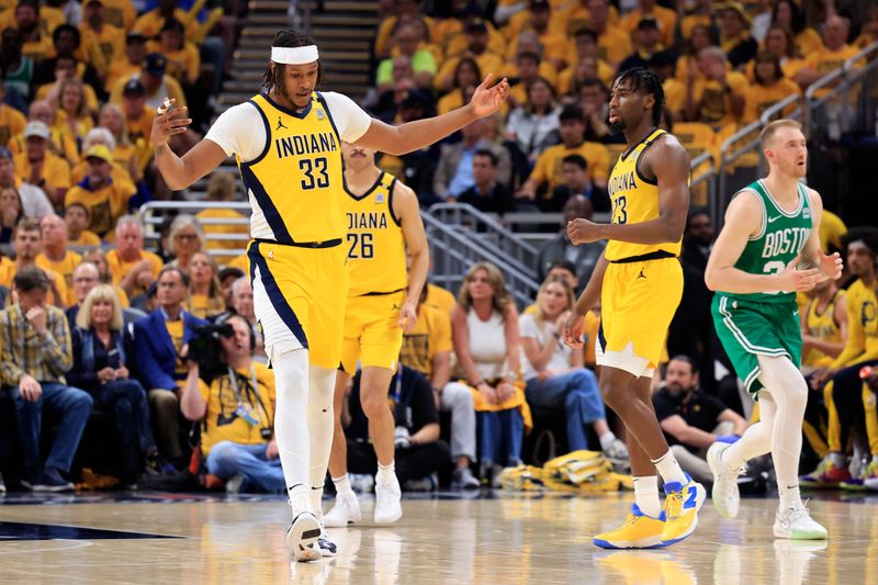 INDIANAPOLIS, INDIANA - MAY 27: Myles Turner #33 and Aaron Nesmith #23 of the Indiana Pacers react during the second quarter in Game Four of the Eastern Conference Finals at Gainbridge Fieldhouse on May 27, 2024 in Indianapolis, Indiana. NOTE TO USER: User expressly acknowledges and agrees that, by downloading and or using this photograph, User is consenting to the terms and conditions of the Getty Images License Agreement. (Photo by Justin Casterline/Getty Images)