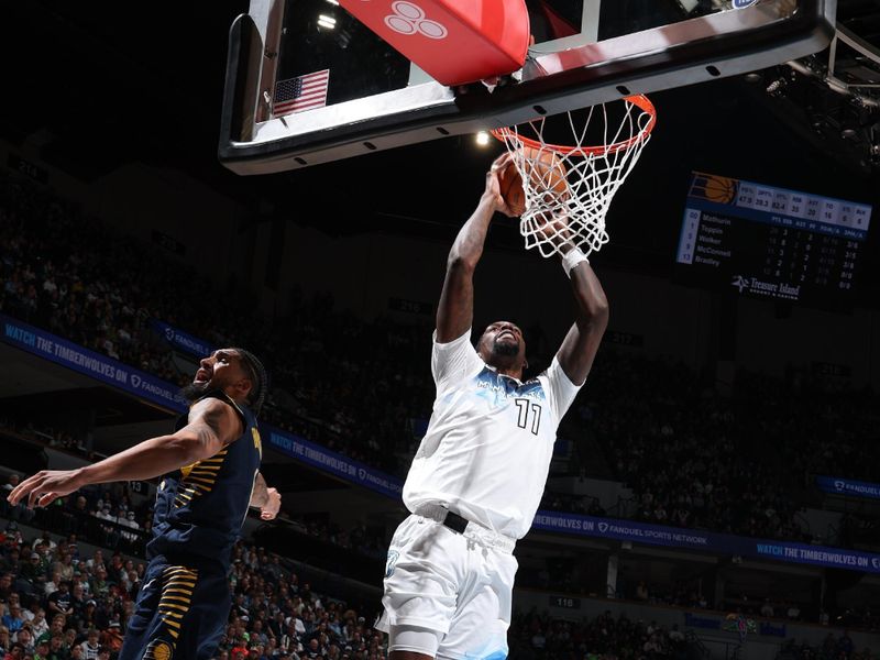 MINNEAPOLIS, MN -  MARCH  17:  Naz Reid #11 of the Minnesota Timberwolves dunks the ball during the game against the Indiana Pacers on March 17, 2025 at Target Center in Minneapolis, Minnesota. NOTE TO USER: User expressly acknowledges and agrees that, by downloading and or using this Photograph, user is consenting to the terms and conditions of the Getty Images License Agreement. Mandatory Copyright Notice: Copyright 2025 NBAE (Photo by David Sherman/NBAE via Getty Images)