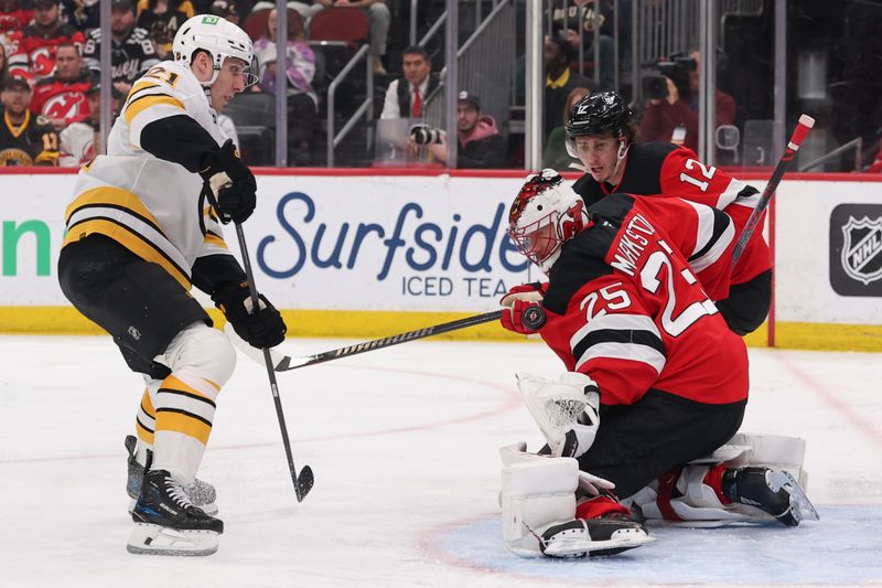 Mar 16, 2026; Newark, New Jersey, USA; New Jersey Devils goaltender Jacob Markstrom (25) makes a save against the Boston Bruins during the third period at Prudential Center. Mandatory Credit: Ed Mulholland-Imagn Images
