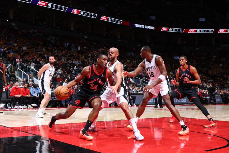 TORONTO, CANADA - MARCH 23:  Ja'Kobe Walter #14 of the Toronto Raptors handles the ball during the game against the San Antonio Spurs on March 23, 2025 at the Scotiabank Arena in Toronto, Ontario, Canada.  NOTE TO USER: User expressly acknowledges and agrees that, by downloading and or using this Photograph, user is consenting to the terms and conditions of the Getty Images License Agreement.  Mandatory Copyright Notice: Copyright 2025 NBAE (Photo by Vaughn Ridley/NBAE via Getty Images)