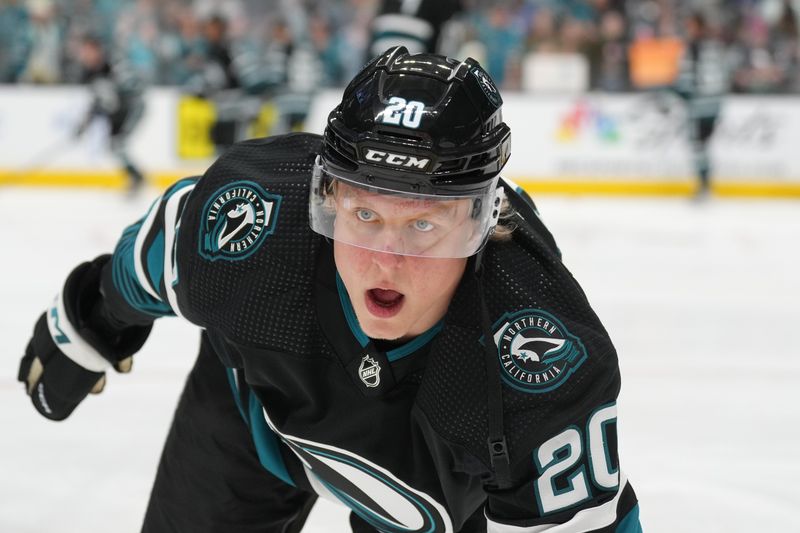 Feb 17, 2024; San Jose, California, USA; San Jose Sharks left wing Fabian Zetterlund (20) warms up while wearing the new cali fin jersey before the game against the Columbus Blue Jackets at SAP Center at San Jose. Mandatory Credit: Darren Yamashita-USA TODAY Sports