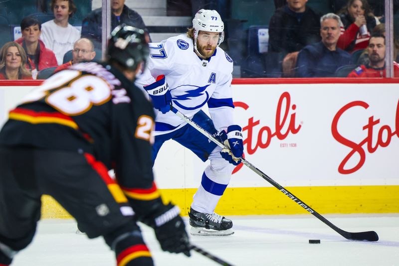 Jan 21, 2023; Calgary, Alberta, CAN; Tampa Bay Lightning defenseman Victor Hedman (77) controls the puck against the Calgary Flames during the first period at Scotiabank Saddledome. Mandatory Credit: Sergei Belski-USA TODAY Sports