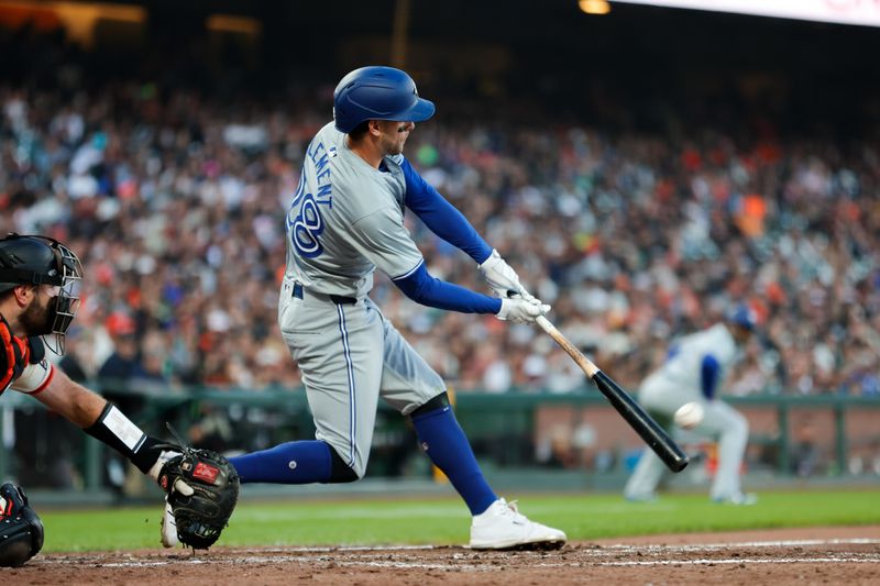 Jul 10, 2024; San Francisco, California, USA; Toronto Blue Jays third base Ernie Clement (28) hits a three-run home run during the fifth inning against the San Francisco Giants at Oracle Park. Mandatory Credit: Sergio Estrada-USA TODAY Sports