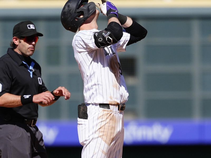 Apr 10, 2025; Denver, Colorado, USA; Colorado Rockies right fielder Zac Veen (13) reacts following his RBI double in the eighth inning against the Milwaukee Brewers at Coors Field. Mandatory Credit: Ron Chenoy-Imagn Images