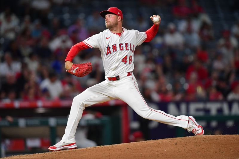Aug 20, 2025; Anaheim, California, USA; Los Angeles Angels pitcher Reid Detmers (48) throws against the Cincinnati Reds during the eighth inning at Angel Stadium. Mandatory Credit: Gary A. Vasquez-Imagn Images