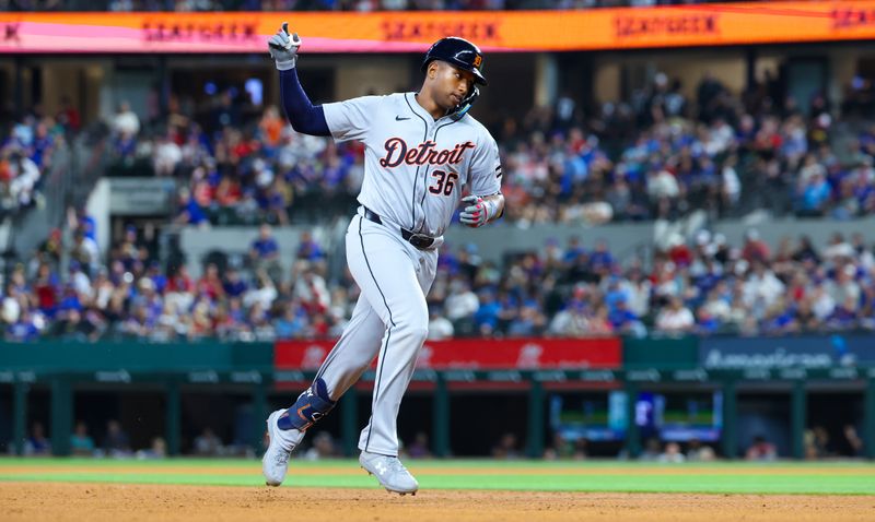 Jun 5, 2024; Arlington, Texas, USA;  Detroit Tigers designated hitter Justyn-Henry Malloy (36) reacts after hitting a home run during the sixth inning against the Texas Rangers at Globe Life Field. Mandatory Credit: Kevin Jairaj-USA TODAY Sports