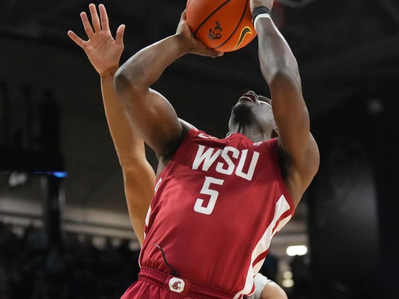 Jan 22, 2023; Boulder, Colorado, USA; Washington State Cougars guard TJ Bamba (5) shoots the ball in the second half against the Colorado Buffaloes at the CU Events Center. Mandatory Credit: Ron Chenoy-USA TODAY Sports