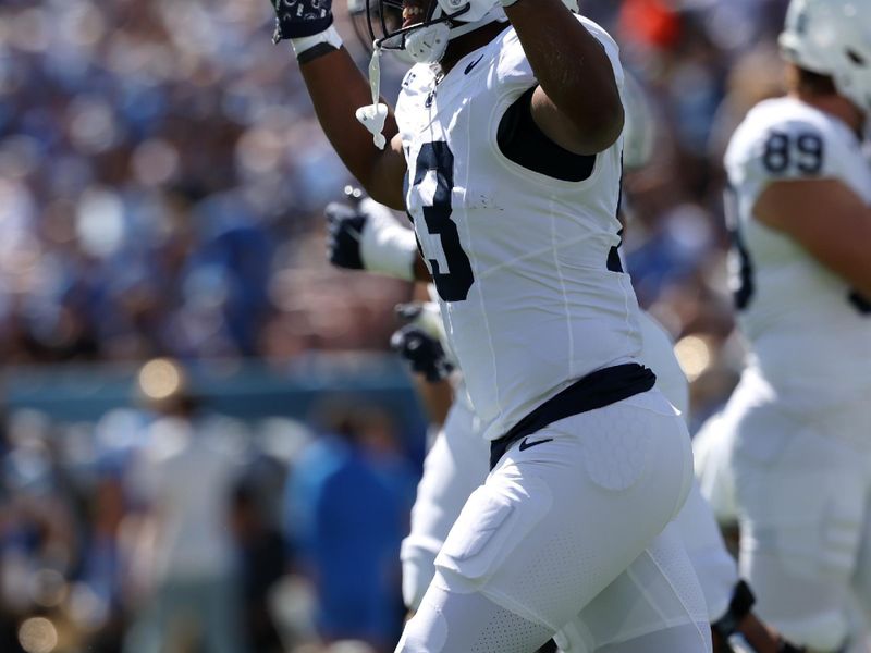 Oct 4, 2025; Pasadena, California, USA;  Penn State Nittany Lions running back Kaytron Allen (13) celebrates after scoring a touchdown during the first quarter against the UCLA Bruins at Rose Bowl. Mandatory Credit: Kiyoshi Mio-Imagn Images
