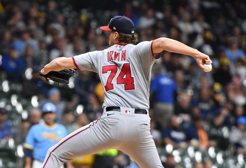 Sep 15, 2023; Milwaukee, Wisconsin, USA; Washington Nationals starting pitcher Jake Irvin (74) delivers a pitch against the Milwaukee Brewers in the first inning at American Family Field. Mandatory Credit: Michael McLoone-USA TODAY Sports