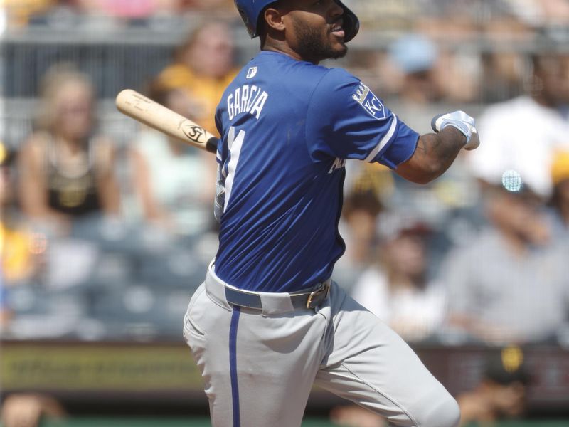 Sep 14, 2024; Pittsburgh, Pennsylvania, USA;  Kansas City Royals left fielder MJ Melendez (1) hits an RBI double against the Pittsburgh Pirates during the fifth inning at PNC Park. Mandatory Credit: Charles LeClaire-Imagn Images