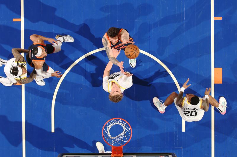 NEW YORK, NY - JANUARY 30: Isaiah Hartenstein #55 of the New York Knicks shoots the ball during the game against the Utah Jazz on January 30, 2024 at Madison Square Garden in New York City, New York.  NOTE TO USER: User expressly acknowledges and agrees that, by downloading and or using this photograph, User is consenting to the terms and conditions of the Getty Images License Agreement. Mandatory Copyright Notice: Copyright 2024 NBAE  (Photo by Nathaniel S. Butler/NBAE via Getty Images)