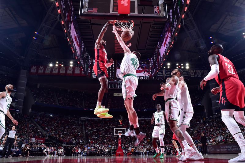 HOUSTON, TX - JANUARY 3:  Jalen Green #4 of the Houston Rockets dunks the ball during the game against the Boston Celtics on January 3, 2025 at the Toyota Center in Houston, Texas. NOTE TO USER: User expressly acknowledges and agrees that, by downloading and or using this photograph, User is consenting to the terms and conditions of the Getty Images License Agreement. Mandatory Copyright Notice: Copyright 2025 NBAE (Photo by Logan Riely/NBAE via Getty Images)