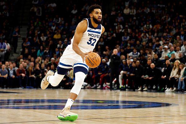 MINNEAPOLIS, MINNESOTA - NOVEMBER 01: Karl-Anthony Towns #32 of the Minnesota Timberwolves drives to the basket against the Denver Nuggets in the first quarter at Target Center on November 01, 2023 in Minneapolis, Minnesota. The Timberwolves defeated the Nuggets 110-89. NOTE TO USER: User expressly acknowledges and agrees that, by downloading and or using this photograph, User is consenting to the terms and conditions of the Getty Images License Agreement. (Photo by David Berding/Getty Images)