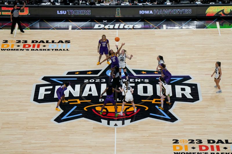 Apr 2, 2023; Dallas, TX, USA; LSU Lady Tigers forward Angel Reese (10) and Iowa Hawkeyes forward Monika Czinano (25) battle for the opening tip in the first half during the final round of the Women's Final Four NCAA tournament at the American Airlines Center. Mandatory Credit: Kirby Lee-USA TODAY Sports