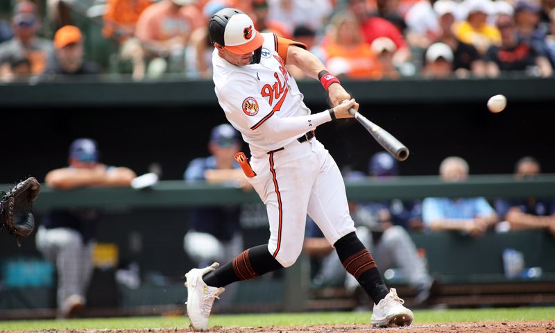 Jun 2, 2024; Baltimore, Maryland, USA; Baltimore Orioles outfielder Austin Hays (21) swings during the third inning against the Tampa Bay Rays at Oriole Park at Camden Yards. Mandatory Credit: Daniel Kucin Jr.-USA TODAY Sports