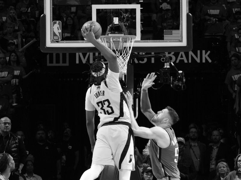 OKLAHOMA CITY, OK - JUNE 8: (EDITORS NOTE: This image was converted into black and white): Myles Turner #33 of the Indiana Pacers dunks the ball during the game against the Oklahoma City Thunder  during Game Two of the 2025 NBA Finals on June 8, 2025 at Paycom Center in Oklahoma City, Oklahoma. NOTE TO USER: User expressly acknowledges and agrees that, by downloading and or using this photograph, User is consenting to the terms and conditions of the Getty Images License Agreement. Mandatory Copyright Notice: Copyright 2025 NBAE (Photo by Jesse D. Garrabrant/NBAE via Getty Images)
