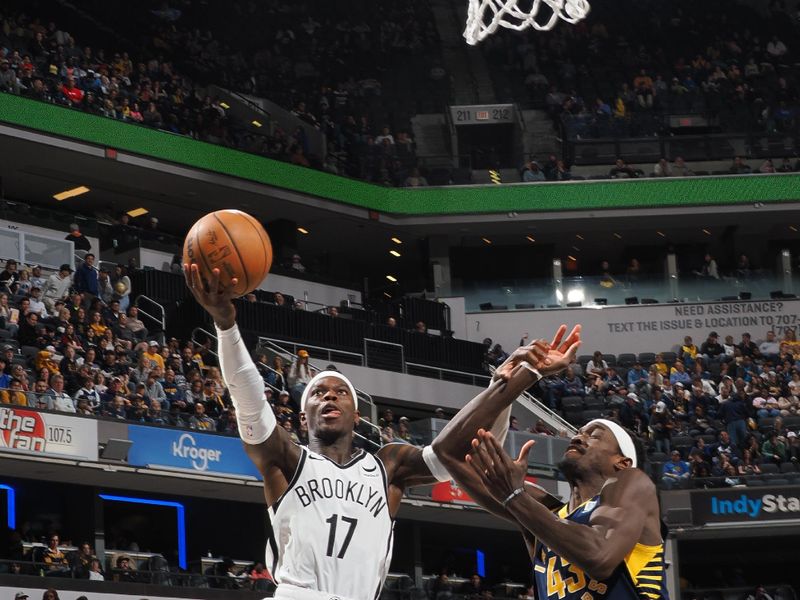 INDIANAPOLIS, IN - APRIL 1: Dennis Schroder #17 of the Brooklyn Nets drives to the basket during the game against the Indiana Pacers on April 1, 2024 at Gainbridge Fieldhouse in Indianapolis, Indiana. NOTE TO USER: User expressly acknowledges and agrees that, by downloading and or using this Photograph, user is consenting to the terms and conditions of the Getty Images License Agreement. Mandatory Copyright Notice: Copyright 2024 NBAE (Photo by Ron Hoskins/NBAE via Getty Images)