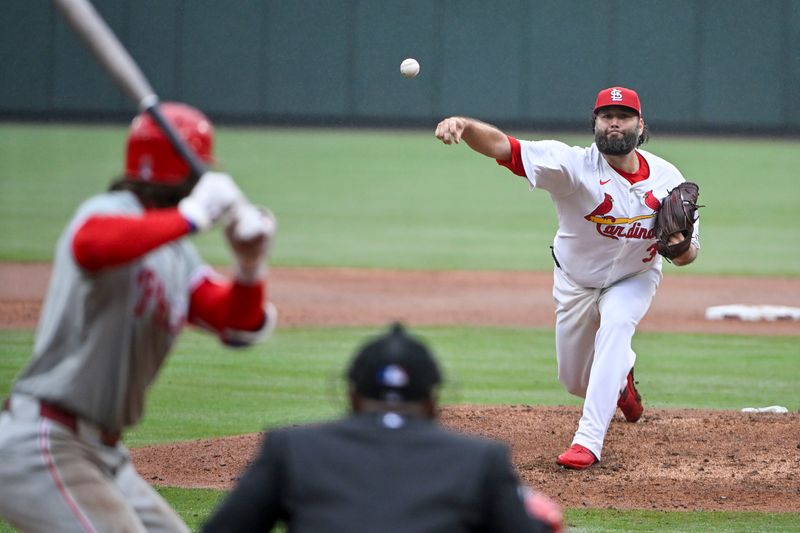 Apr 10, 2024; St. Louis, Missouri, USA;  St. Louis Cardinals starting pitcher Lance Lynn (31) pitches against Philadelphia Phillies third baseman Alec Bohm (28) during the third inning at Busch Stadium. Mandatory Credit: Jeff Curry-USA TODAY Sports