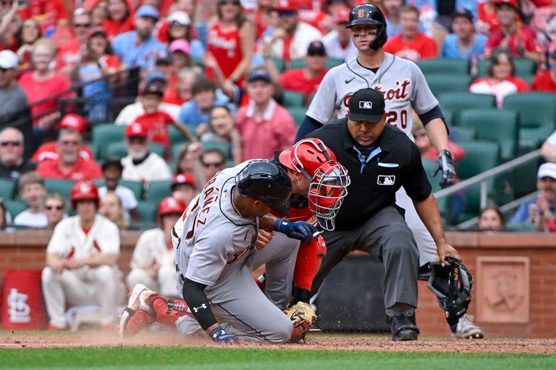 May 6, 2023; St. Louis, Missouri, USA;  St. Louis Cardinals catcher Andrew Knizner (7) tags out Detroit Tigers third baseman Andy Ibanez (77) to end the ninth inning at Busch Stadium. Mandatory Credit: Jeff Curry-USA TODAY Sports