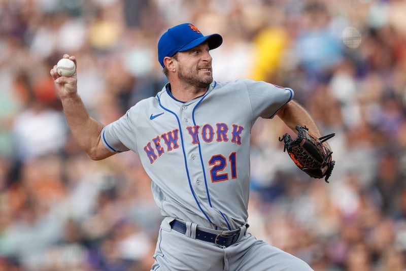 May 26, 2023; Denver, Colorado, USA; New York Mets starting pitcher Max Scherzer (21) pitches in the second inning against the Colorado Rockies at Coors Field. Mandatory Credit: Isaiah J. Downing-USA TODAY Sports