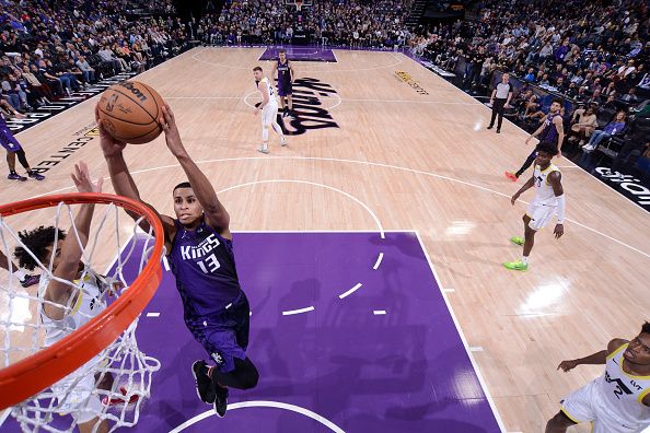 SACRAMENTO, CA - DECEMBER 16: Keegan Murray #13 of the Sacramento Kings drives to the basket during the game against the Utah Jazz on December 16, 2023 at Golden 1 Center in Sacramento, California. NOTE TO USER: User expressly acknowledges and agrees that, by downloading and or using this Photograph, user is consenting to the terms and conditions of the Getty Images License Agreement. Mandatory Copyright Notice: Copyright 2023 NBAE (Photo by Rocky Widner/NBAE via Getty Images)