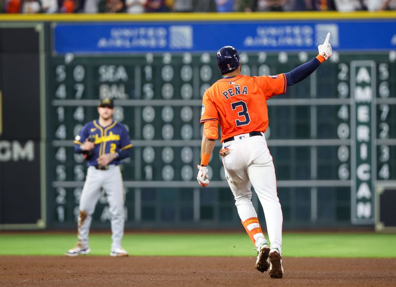 May 17, 2024; Houston, Texas, USA;  Houston Astros shortstop Jeremy Pena (3) rounds the bases after hitting a three-run home run against the Milwaukee Brewers in the fifth inning at Minute Maid Park. Mandatory Credit: Thomas Shea-USA TODAY Sports