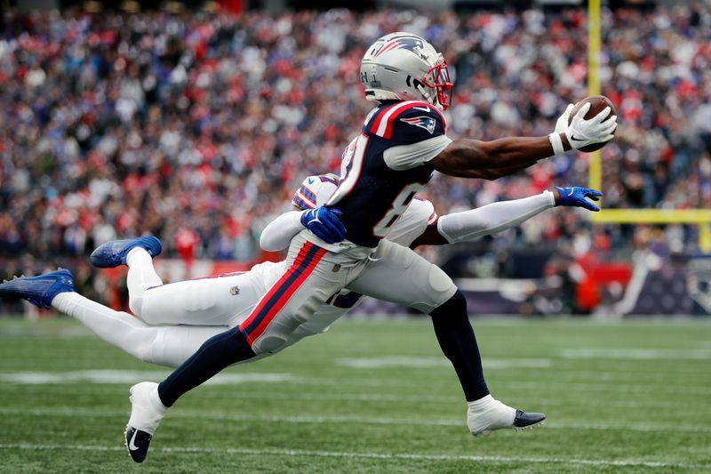 New England Patriots wide receiver Demario Douglas (81) makes a pass reception against Buffalo Bills cornerback Christian Benford (47) during the second half of an NFL football game, Sunday, Oct. 22, 2023, in Foxborough, Mass. (AP Photo/Michael Dwyer)