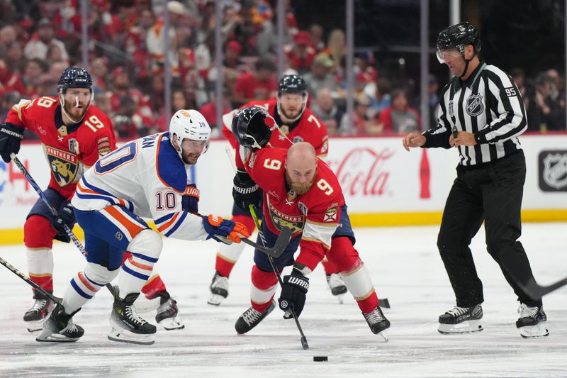 Jun 18, 2024; Sunrise, Florida, USA; Florida Panthers forward Sam Bennett (9) loses his helmet after a faceoff against Edmonton Oilers forward Derek Ryan (10) during the second period in game five of the 2024 Stanley Cup Final at Amerant Bank Arena. Mandatory Credit: Jim Rassol-USA TODAY Sports