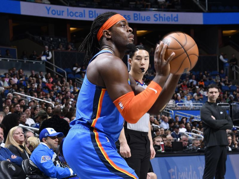 ORLANDO, FL - JANUARY 4:  Luguentz Dort #5 of the Oklahoma City Thunder shoots a three point basket against the Orlando Magic on January 4, 2023 at Amway Center in Orlando, Florida. NOTE TO USER: User expressly acknowledges and agrees that, by downloading and or using this photograph, User is consenting to the terms and conditions of the Getty Images License Agreement. Mandatory Copyright Notice: Copyright 2023 NBAE (Photo by Gary Bassing/NBAE via Getty Images)