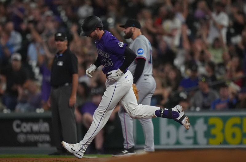 Aug 26, 2024; Denver, Colorado, USA; Colorado Rockies relief pitcher Jake Bird (59) runs off a solo home run in the sixth inning against the Miami Marlins at Coors Field. Mandatory Credit: Ron Chenoy-USA TODAY Sports