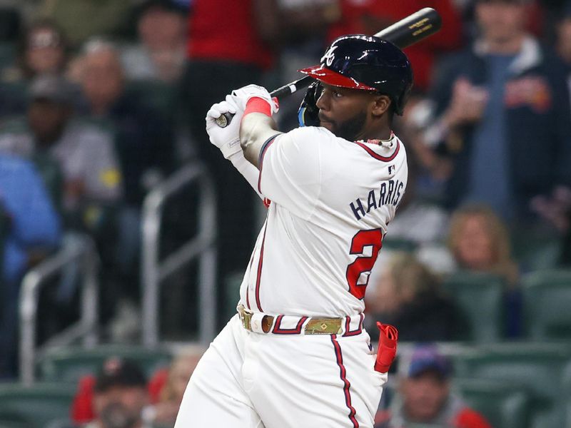 Apr 6, 2024; Atlanta, Georgia, USA; Atlanta Braves center fielder Michael Harris II (23) hits a RBI single against the Arizona Diamondbacks in the seventh inning at Truist Park. Mandatory Credit: Brett Davis-USA TODAY Sports