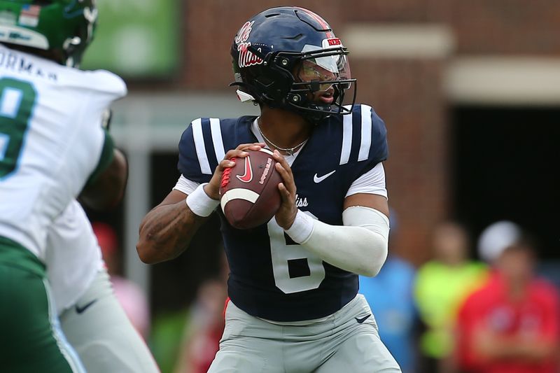 Sep 20, 2025; Oxford, Mississippi, USA; Mississippi Rebels quarterback Trinidad Chambliss (6) drops back to pass during the second quarter against the Tulane Green Wave at Vaught-Hemingway Stadium. Mandatory Credit: Petre Thomas-Imagn Images