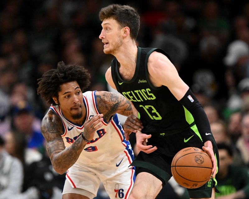 BOSTON, MASSACHUSETTS - MARCH 06: Kelly Oubre Jr. #9 of the Philadelphia 76ers defends Drew Peterson #13 of the Boston Celtics during the first quarter at the TD Garden on March 06, 2025 in Boston, Massachusetts. NOTE TO USER: User expressly acknowledges and agrees that, by downloading and or using this photograph, User is consenting to the terms and conditions of the Getty Images License Agreement. (Photo by Brian Fluharty/Getty Images)