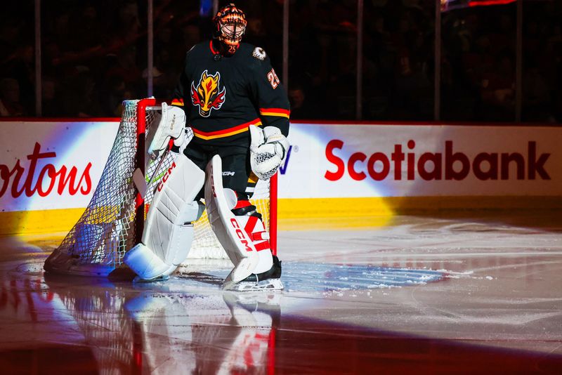 Jan 23, 2024; Calgary, Alberta, CAN; Calgary Flames goaltender Jacob Markstrom (25) takes the ice prior to the game against the St. Louis Blues at Scotiabank Saddledome. Mandatory Credit: Sergei Belski-USA TODAY Sports