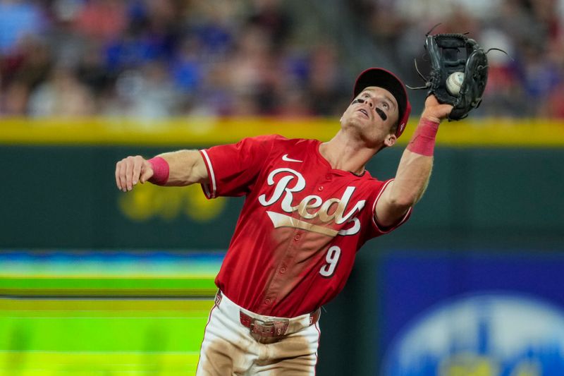 Sep 20, 2025; Cincinnati, Ohio, USA; Cincinnati Reds second baseman Matt McLain (9) fields the ball for an out hit by Chicago Cubs third baseman Matt Shaw (6) in the fifth inning at Great American Ball Park. Mandatory Credit: Aaron Doster-Imagn Images