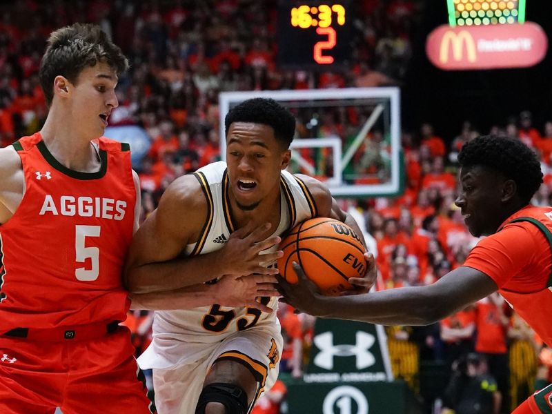 Feb 24, 2023; Fort Collins, Colorado, USA; Colorado State Rams guard Isaiah Stevens (4) at far right, steals the ball from Wyoming Cowboys guard Xavier DuSell (53) as Colorado State Rams guard Baylor Hebb (5) defends at Moby Arena. Mandatory Credit: Michael Madrid-USA TODAY Sports