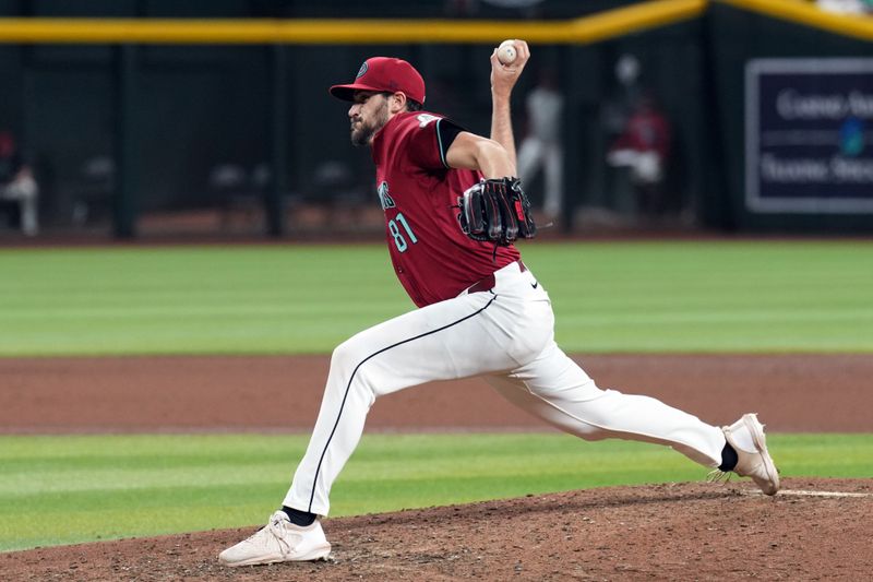 May 25, 2024; Phoenix, Arizona, USA; Arizona Diamondbacks pitcher Ryan Thompson (81) pitches against the Miami Marlins during the seventh inning at Chase Field. Mandatory Credit: Joe Camporeale-USA TODAY Sports