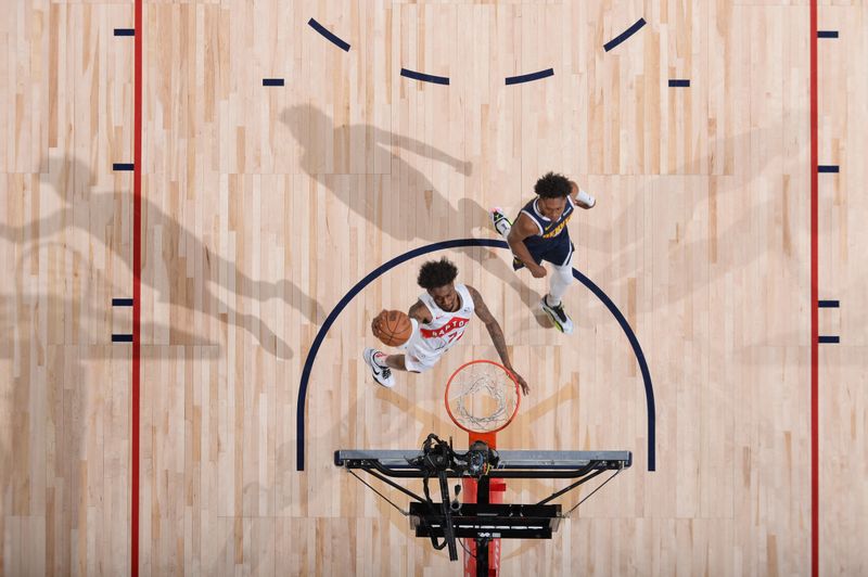 DENVER, CO - MARCH 11: Jalen McDaniels #2 of the Toronto Raptors dunks the ball during the game against the Denver Nuggets on March 11, 2024 at the Ball Arena in Denver, Colorado. NOTE TO USER: User expressly acknowledges and agrees that, by downloading and/or using this Photograph, user is consenting to the terms and conditions of the Getty Images License Agreement. Mandatory Copyright Notice: Copyright 2024 NBAE (Photo by Bart Young/NBAE via Getty Images)