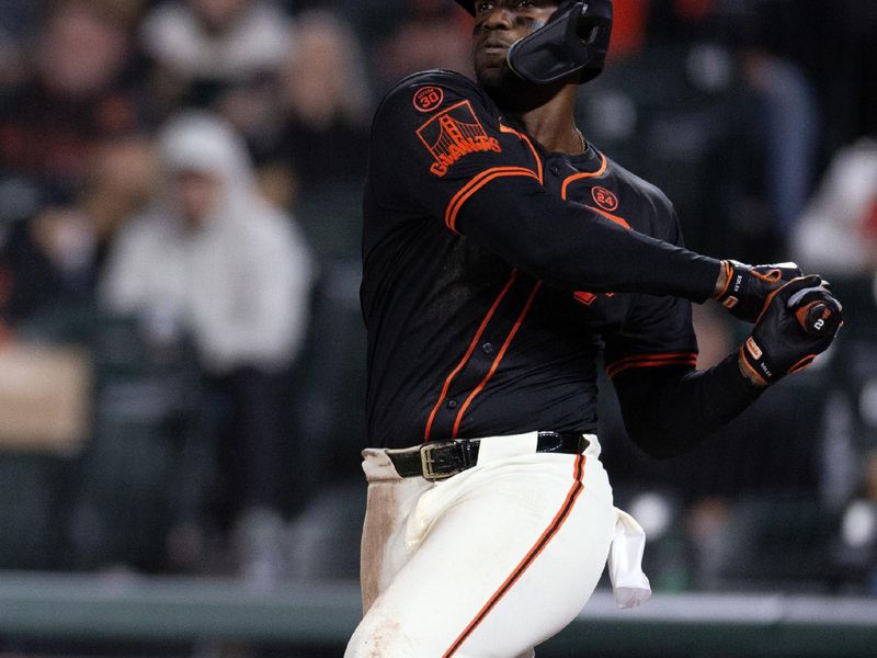 Jul 27, 2024; San Francisco, California, USA; San Francisco Giants designated hitter Jorge Soler (2) follows through on a double against the Colorado Rockies during the fifth inning at Oracle Park. Mandatory Credit: D. Ross Cameron-USA TODAY Sports