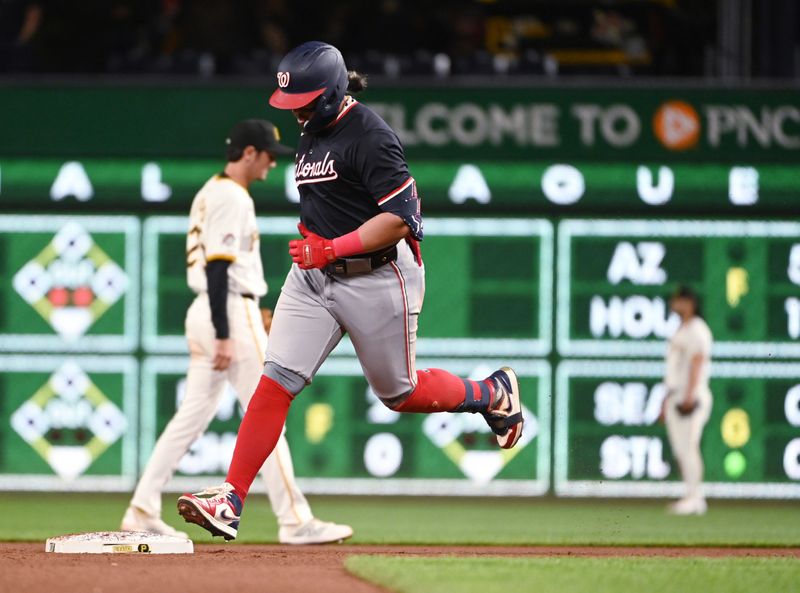 Sep 7, 2024; Pittsburgh, Pennsylvania, USA; Washington Nationals first baseman Andres Chaparro (19) rounds the bases after hitting a game-tying two-run home run against the Pittsburgh Pirates during the seventh  inning of the second game of a double header at PNC Park. Mandatory Credit: Philip G. Pavely-Imagn Images